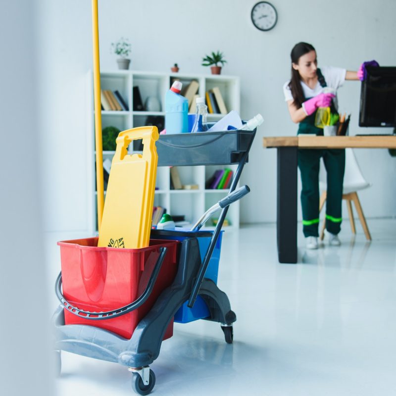 young-female-janitor-cleaning-office-with-various-cleaning-equipment.jpg young-female-janitor-cleaning-office-with-various-cleaning-equipment.jpg
